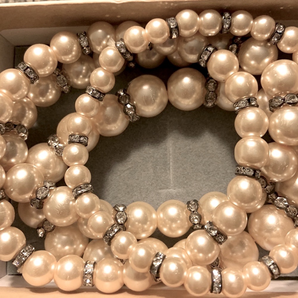 4 Beige beaded bracelets